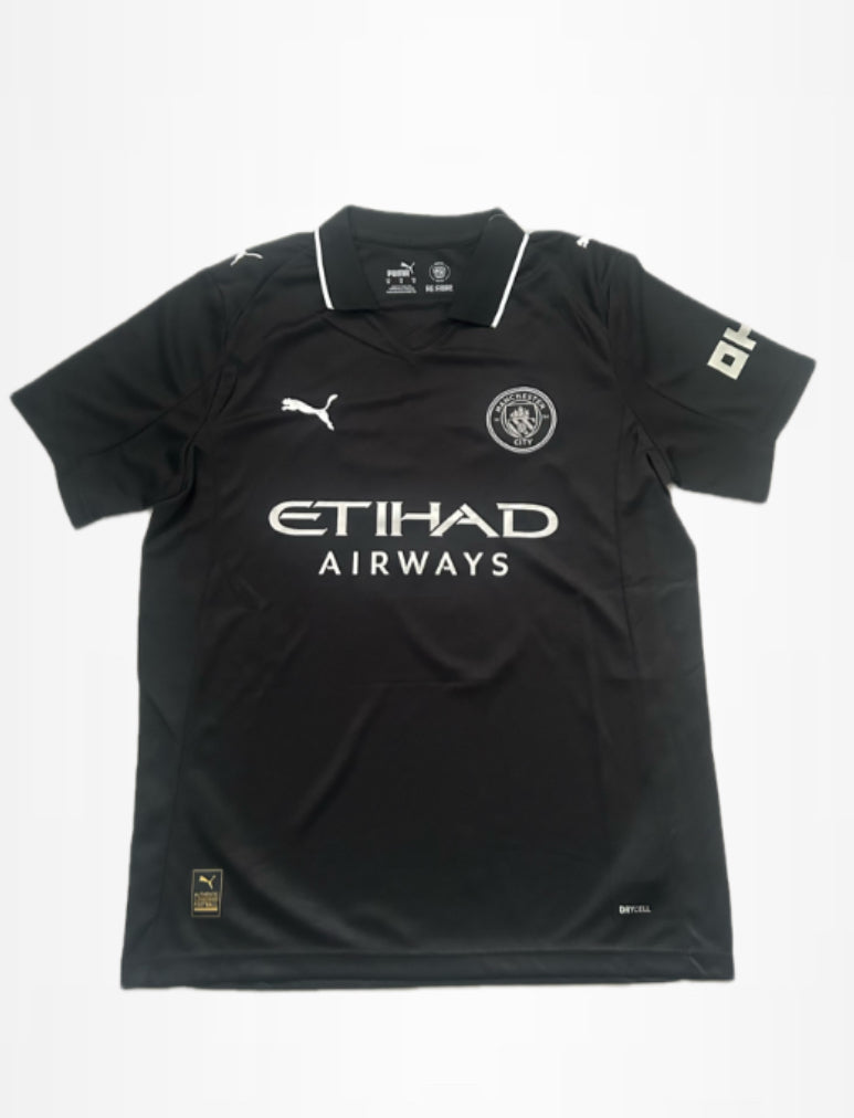 Man City away kit -black and silver