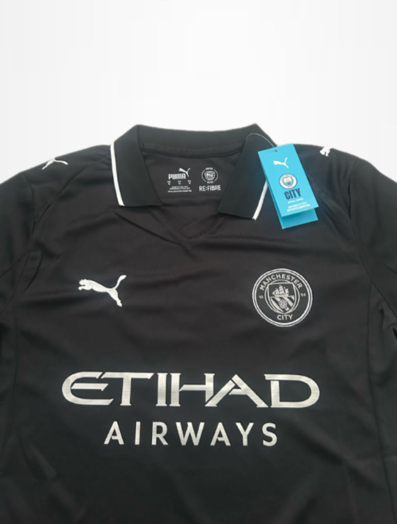 Man City away kit -black and silver